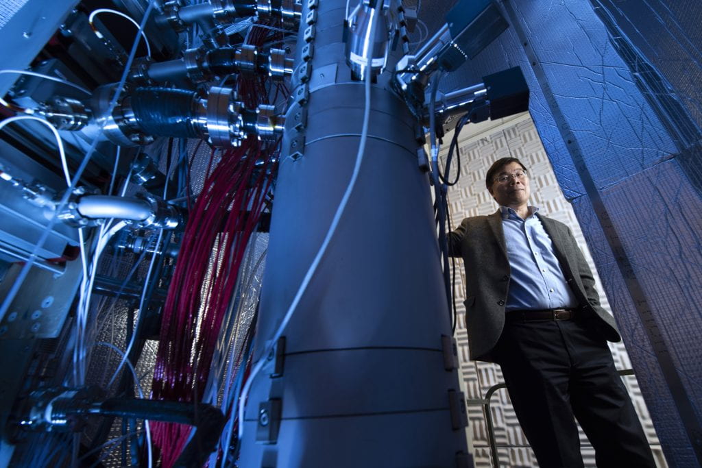 “Our results also clearly demonstrated that the collective atomic vibrations in crystals undergo atomic-level fluctuations depending on the elements and atomic sites, challenging the traditional model that assumes a uniform distribution of phonon wave functions,” says co-author and UC Irvine Distinguished Professor Xiaoqing Pan, here beside an electron energy-loss spectroscopy instrument in his laboratory. Steve Zylius / UC Irvine