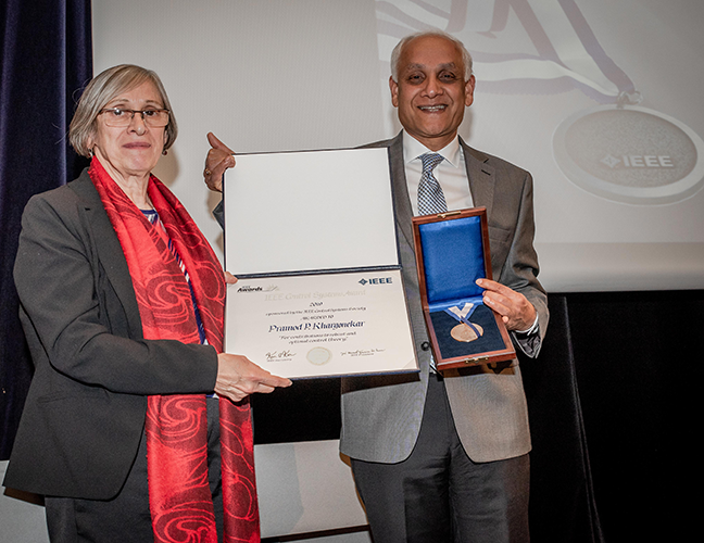 Ljiljana Trajković, professor of engineering at Simon Fraser University, presented the IEEE award to Khargonekar on behalf of the organization's Board of Directors.