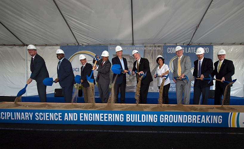 Digging in at the groundbreaking ceremony are, from left: Brian Pratt, Greg Washington, Enrique Lavernia, Pramod Khargonekar, Henry Samueli, Chancellor Howard Gillman, Meredith Michaels, Ken Janda, Marios Papaefthymiou and Brian Hervey.