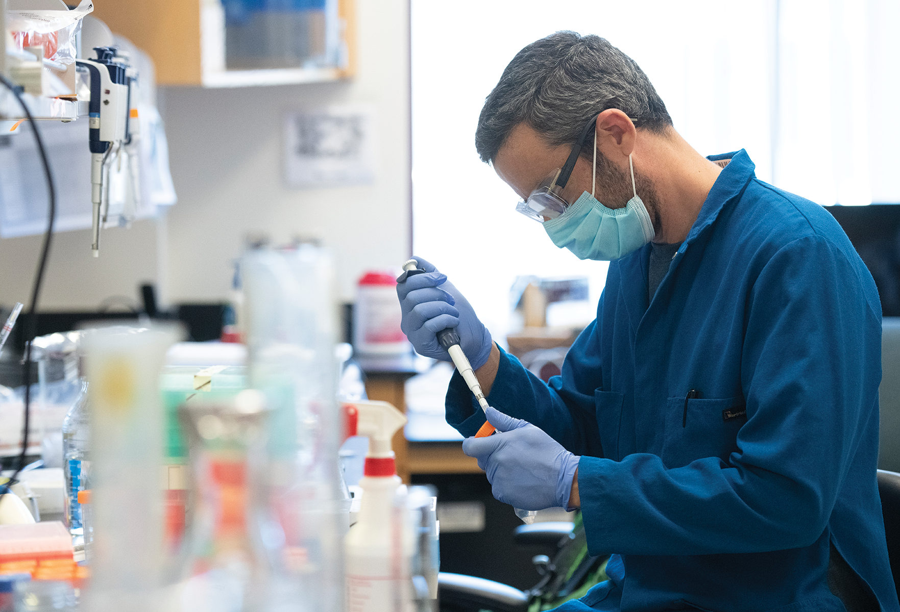 Alon Wellner, a postdoctoral scholar in the laboratory of Chang Liu, UCI assistant professor of biomedical engineering, is part of a project which seeks to accelerate treatments for COVID-19 and other viral infections by exploiting fast and efficient antibody generation in yeast cells. Steve Zylius / UCI