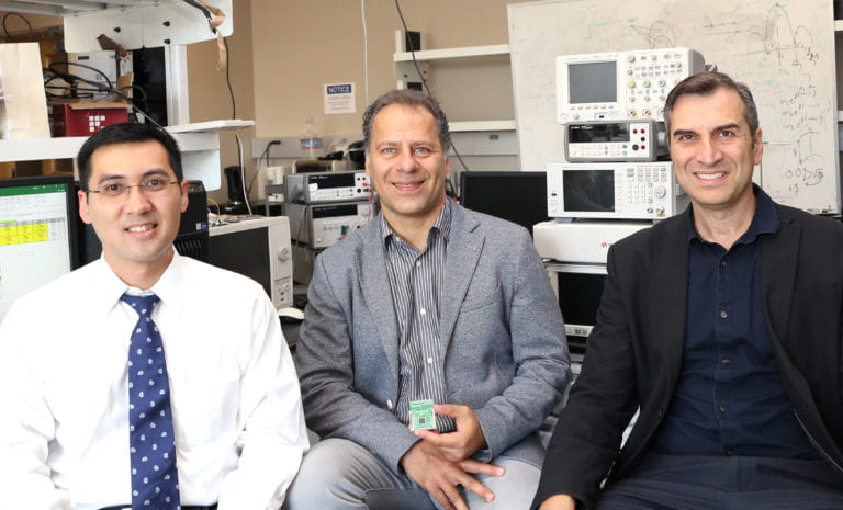 UC Irvine researchers (from left) Dr. An Do, associate professor of neurology; Payam Heydari, professor of electrical engineering and computer science; and Zoran Nenadic, professor of biomedical engineering, recently participated in a study that demonstrated a brain-computer interface technology that enables spinal cord injury patients to walk with a robotic exoskeleton and feel lifelike sensory responses, a key factor in safe and realistic mobility. Debbie Morales / UC Irvine