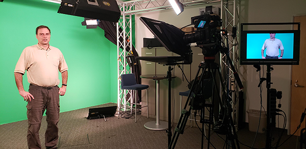 James Brody, associate professor of biomedical engineering, records his popular BME3 class sessions in the UCI recording studio. James Brody, associate professor of biomedical engineering, records his popular BME3 class sessions in the UCI recording studio.