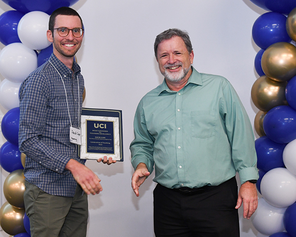 David Copp (left), the Engineering Dean’s Honoree at the 2024 Celebration of Teaching Awards, is congratulated by Vice Provost of Teaching and Learning Michael Dennin. David Copp (left), the Engineering Dean’s Honoree at the 2024 Celebration of Teaching Awards, is congratulated by Vice Provost of Teaching and Learning Michael Dennin.