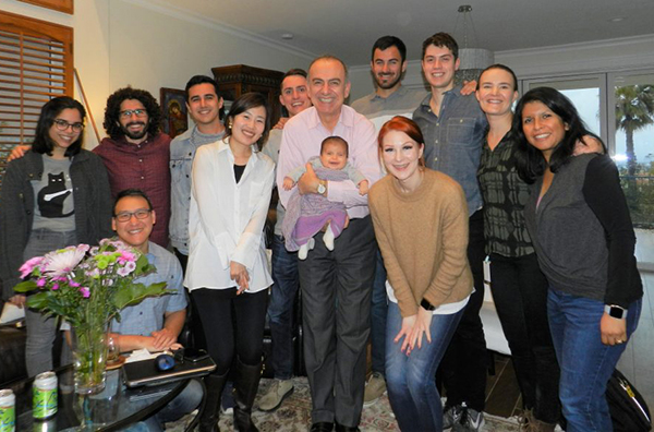 Gabriela Espinosa (far right), a former postdoctoral researcher in Kyriacos Athanasiou’s lab, attends the lab team retreat with her 4-month-old daughter (pictured center, in the arms of Athanasiou).