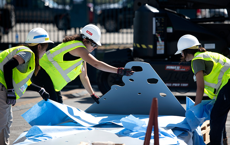 Female students putting the home together at the 2023 OC Sustainability Decathlon. (Photo: Steve Zylius/UC Irvine) Female students putting the home together at the 2023 OC Sustainability Decathlon. (Photo: Steve Zylius/UC Irvine)