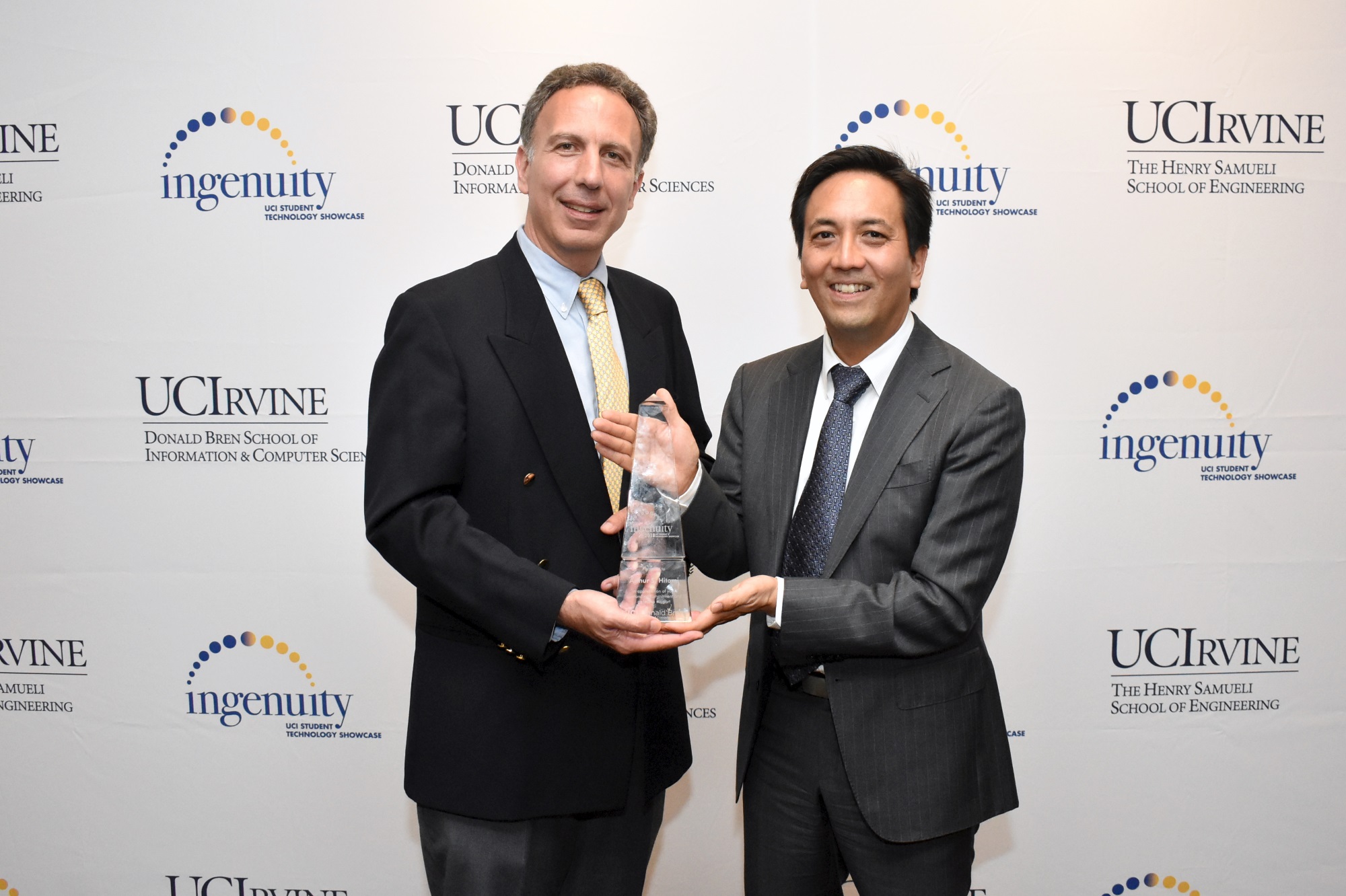 Dean Marios Papaefthymiou and ICS Ingenuity Award winner Arthur Hitomi.