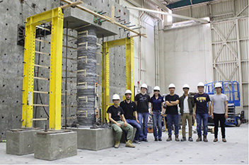 Jones, pictured third from left, researches the potential to replace elements of concrete mixtures with recycled materials.