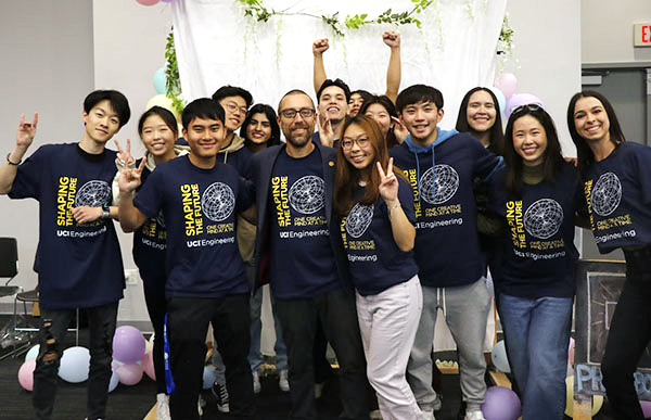 Dean Magnus Egerstedt (center) joins students participating in E-Week’s kick-off fair in the Student Center.