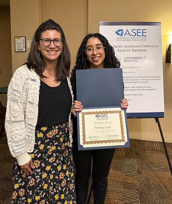 Melissa Lepe (right) and her co-adviser Natascha Buswell (left) pose at the American Society of Engineering Education Pacific Southwest Regional Conference, where Lepe was recognized with an Outstanding Graduate Student Award. Melissa Lepe (right) and her co-adviser Natascha Buswell (left) pose at the American Society of Engineering Education Pacific Southwest Regional Conference, where Lepe was recognized with an Outstanding Graduate Student Award.