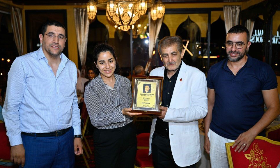 Pictured, from left, are Conference General Chair Brahim El Bhiri, Ms.  Aboutajdine, daughter of the late Driss Aboutajdine, Ayman Mosallam and Conference Co-Chair Anis Moumen.  Pictured, from left, are Conference General Chair Brahim El Bhiri, Ms.  Aboutajdine, daughter of the late Driss Aboutajdine, Ayman Mosallam and Conference Co-Chair Anis Moumen.