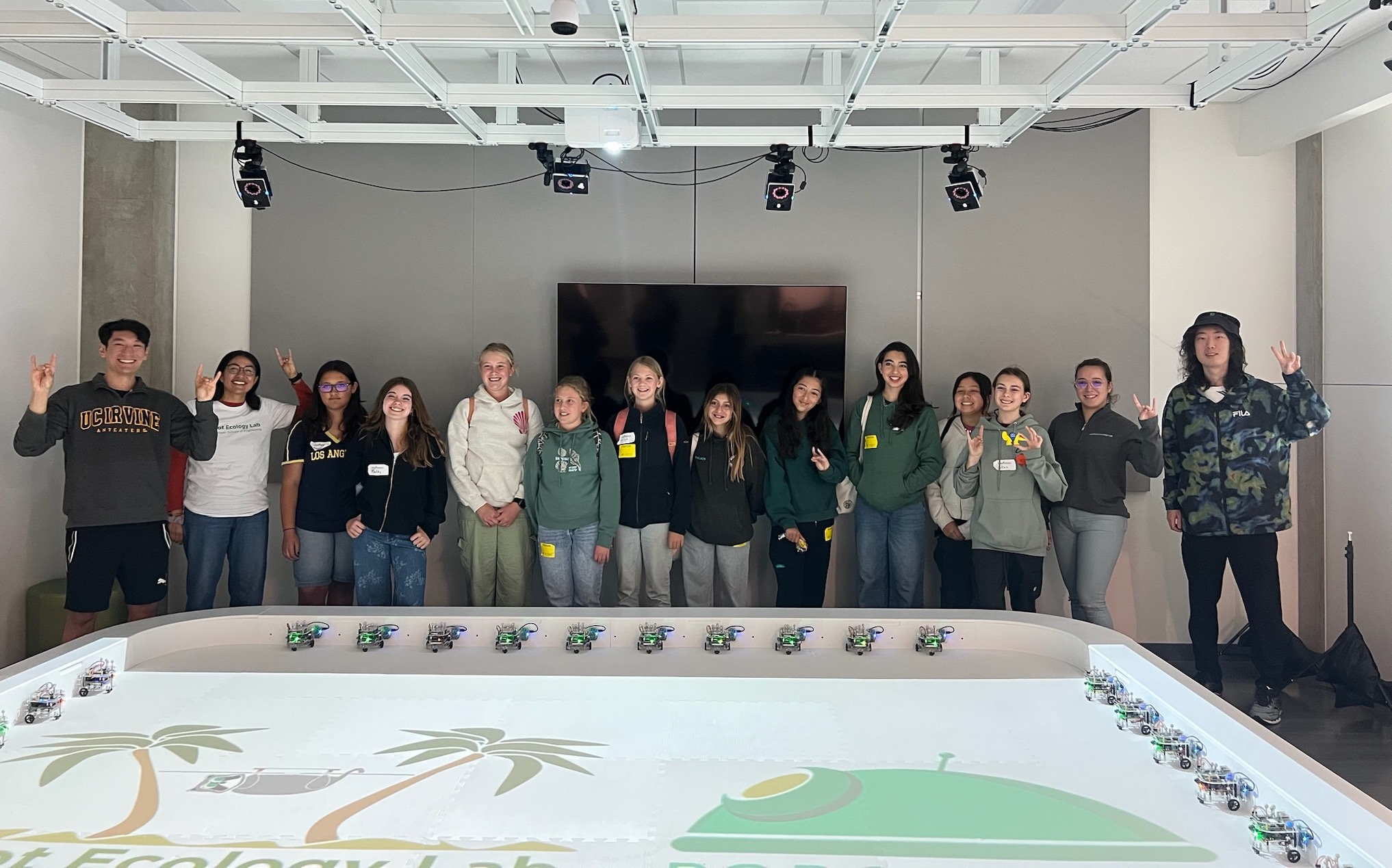 Graduate students Alex Nguyen, Diana Morales, Riwa Karam, Ruoyu Lin with a group of middle school students in the Robot Ecology Lab. Graduate students Alex Nguyen, Diana Morales, Riwa Karam, Ruoyu Lin with a group of middle school students in the Robot Ecology Lab.