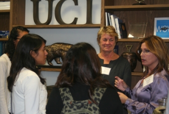 ICS professor Debra Richardson and mentor Sarah Drislane speak with students at the event