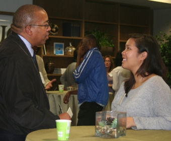 Engineering alumnus David Braden from Boeing chats with student Ada Guan