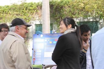 Professor Fadi Kurdahi talks with student