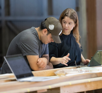 Project manager, wings lead, and mechanical engineering student Silvia Tinelli speaks with Jonathan Oropeza Photo: Flying Leathernecks Heritage Foundation Project manager, wings lead, and mechanical engineering student Silvia Tinelli speaks with Jonathan Oropeza Photo: Flying Leathernecks Heritage Foundation