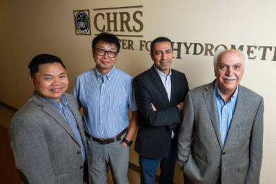 The leadership team of UC Irvine’s Center for Hydrometeorology and Remote Sensing includes (from left) Phu Nguyen, associate adjunct professor of civil and environmental engineering; Kuo-Lin Hsu, professor of civil and environmental engineering; Amir AghaKouchak, Chancellor’s Professor of civil and environmental engineering; and CHRS founder and former director Soroosh Sorooshian, the Henry Samueli Endowed Chair in Engineering. Steve Zylius / UC Irvine