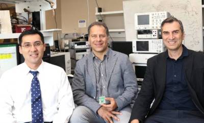 UC Irvine researchers (from left) Dr. An Do, associate professor of neurology; Payam Heydari, professor of electrical engineering and computer science; and Zoran Nenadic, professor of biomedical engineering, recently participated in a study that demonstrated a brain-computer interface technology that enables spinal cord injury patients to walk with a robotic exoskeleton and feel lifelike sensory responses, a key factor in safe and realistic mobility. Debbie Morales / UC Irvine